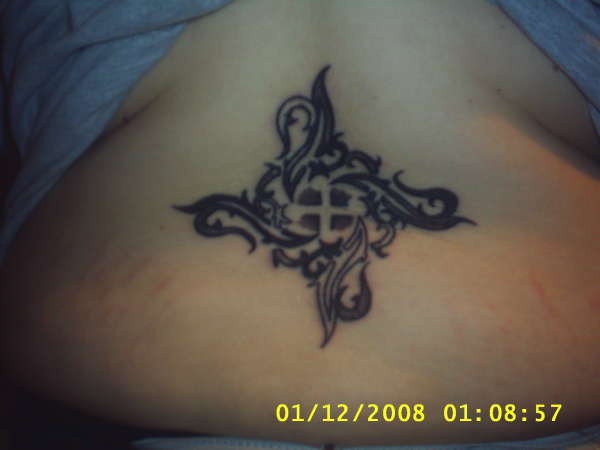 tribal on back tattoo