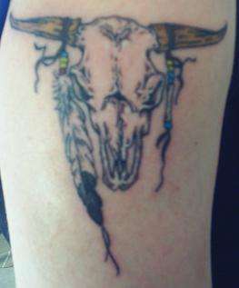 Traditional cattle skull tattoo