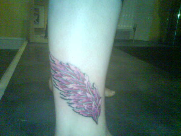 my wings on my ankles tattoo