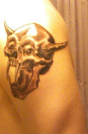 Skull with Fangs and Horns tattoo