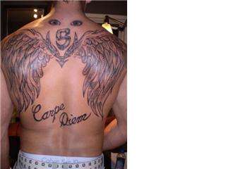 Sams's wings tattoo