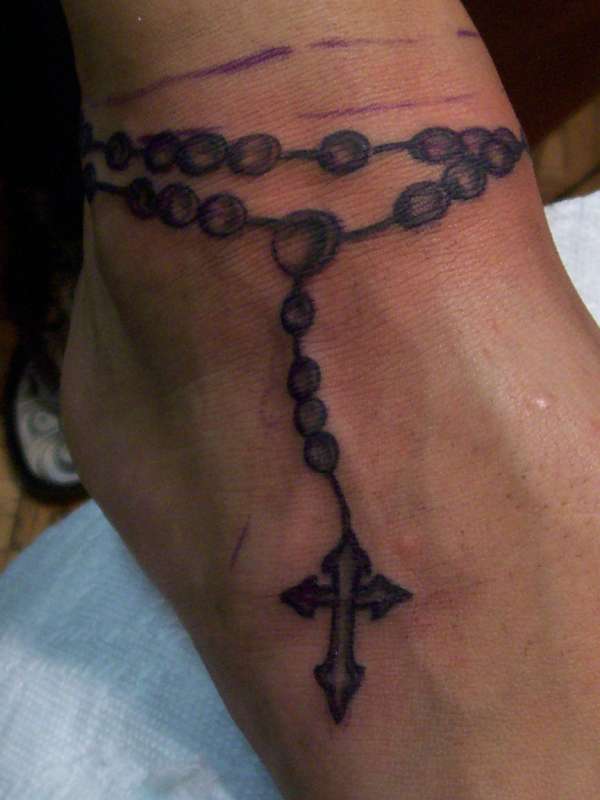 Free-hand Rosary tattoo