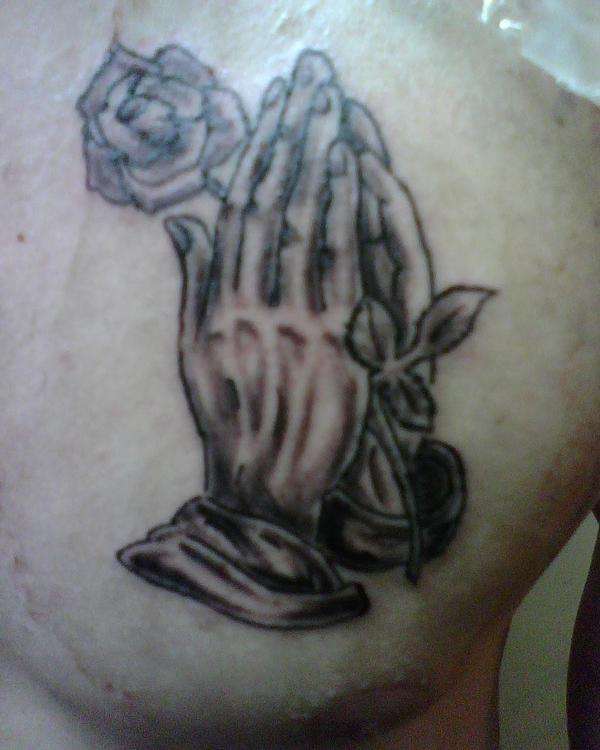 praying hands tattoo