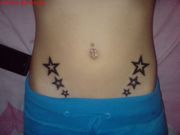 starry belly tattoo