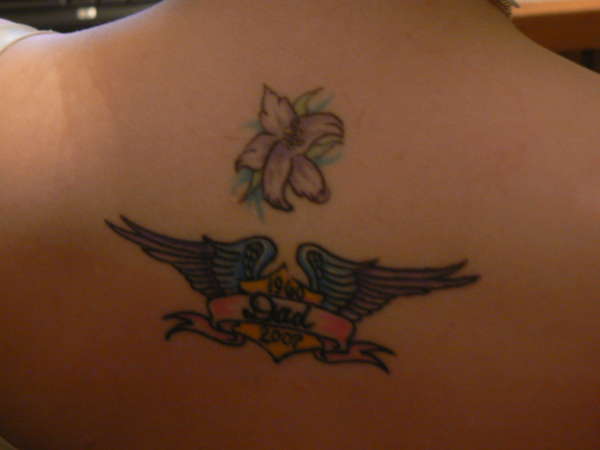 a hibiscus and in memory of my father tattoo