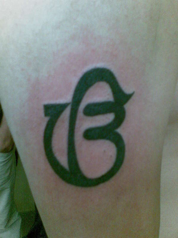 ek aom kar tattoo