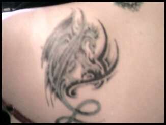 left twin dragon tattoo