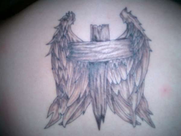 cross and wings tattoo
