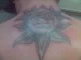 My Sun On back tattoo