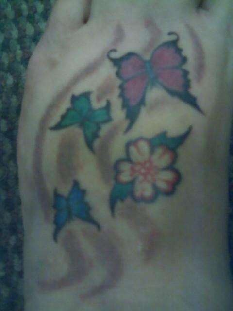 Foot Butterflies and flowers tattoo