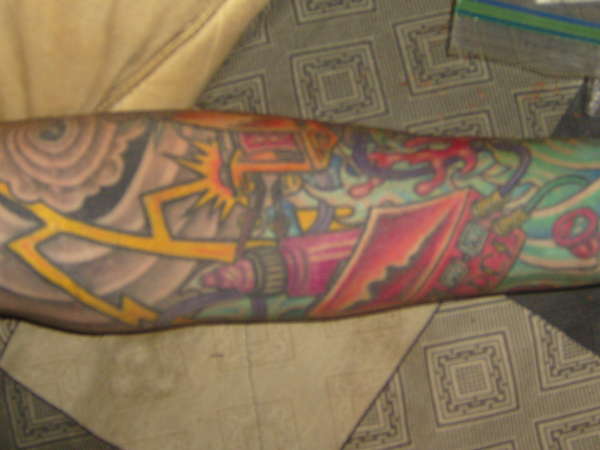 Swingate machine/inner arm tattoo