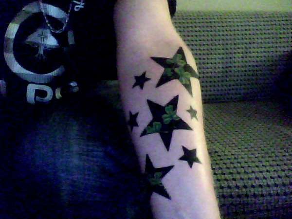 7 stars & 7 shamrocks tattoo
