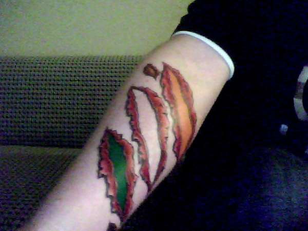 tears with ireland flag under skin tattoo