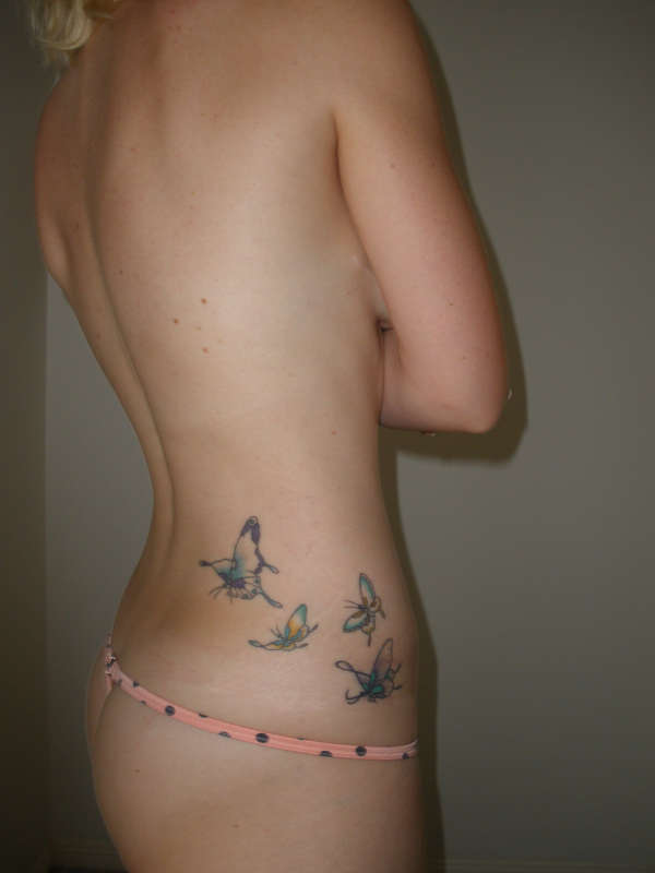 Butterfly Hip tattoo.