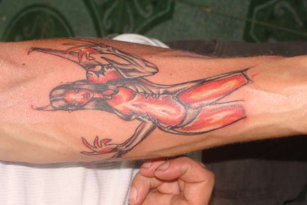 demon drag tattoo