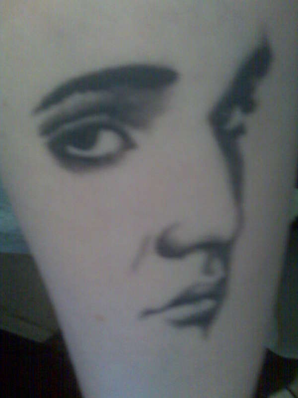 Elvis Again tattoo