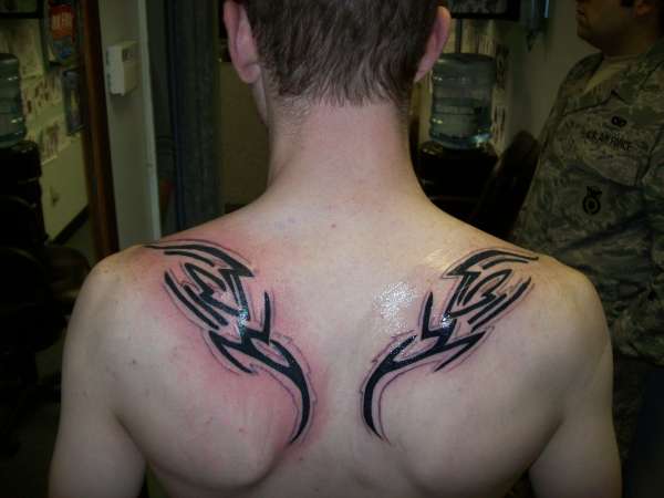 tribal back tattoo