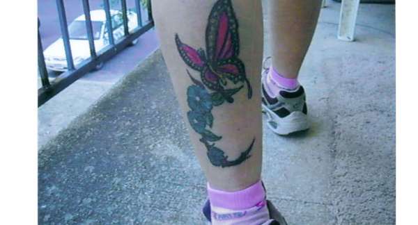Close-up of butterfly tat tattoo