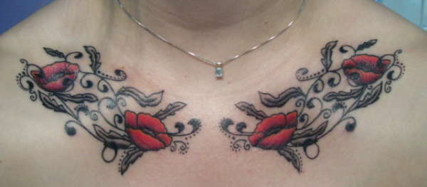 Poppy chest piece tattoo