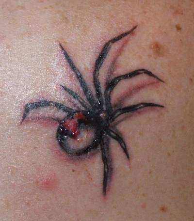 Realistic Black Widow tattoo