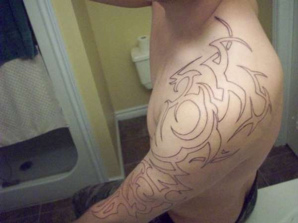 Right arm tribal tattoo