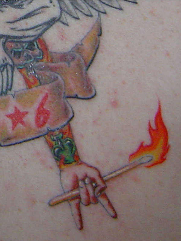 Detail of the fire arm of my back tattoo tattoo