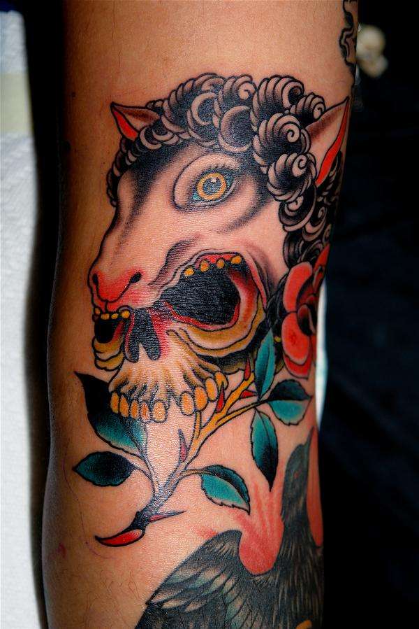 Skull Vomit tattoo