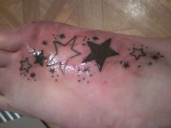 5 Stars on foot tattoo