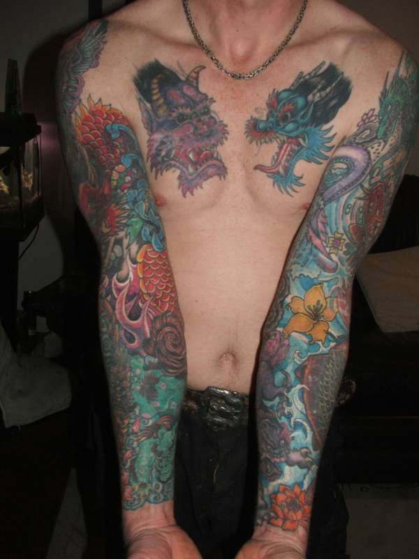 sleeves done at last tattoo