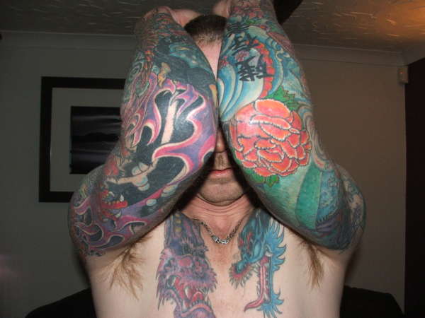 sleeves done at last tattoo