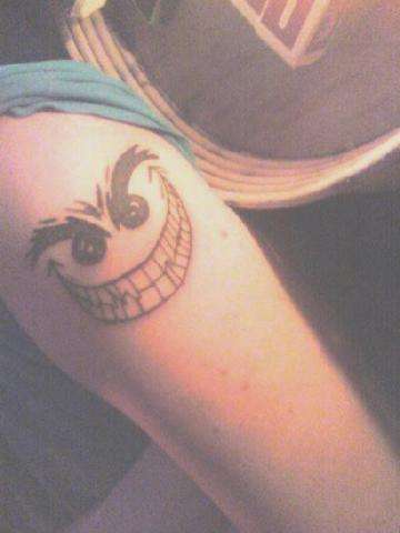 smiley face tattoo