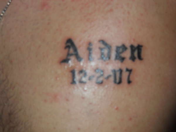 sons name tattoo