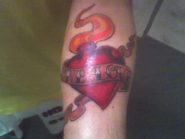 Sacred heart one love tattoo