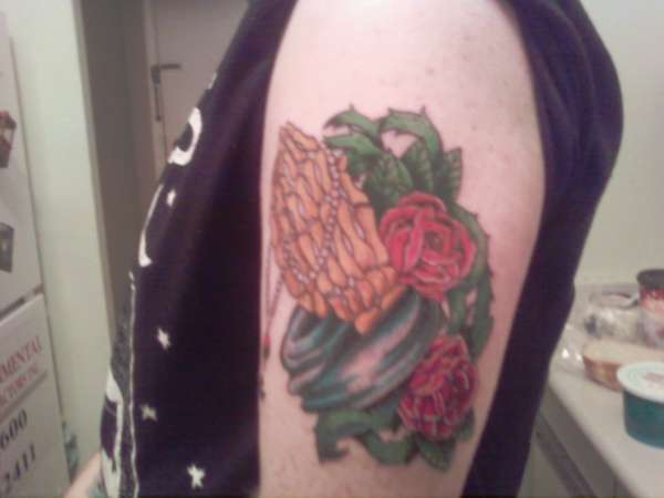 Praying hands tattoo