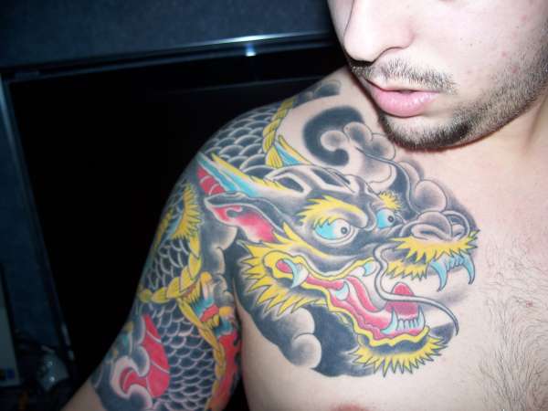 dragon chest plate tattoo