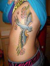 left side tattoo