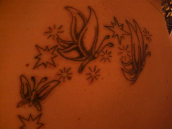 Butterfly's and stars tattoo