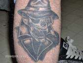 pimp skull tattoo