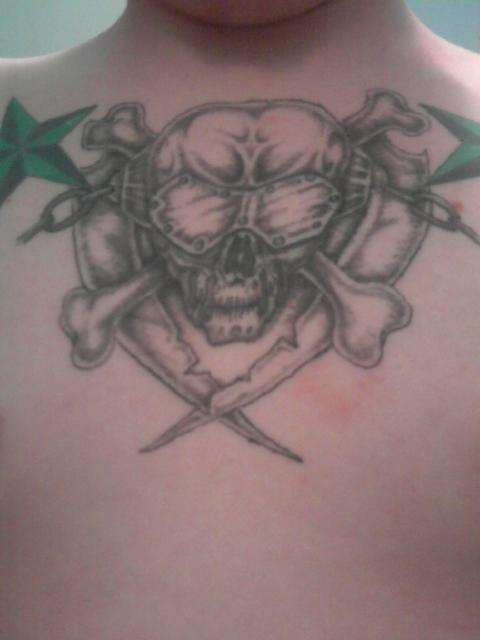 Vic Rattlehead Chest tat tattoo