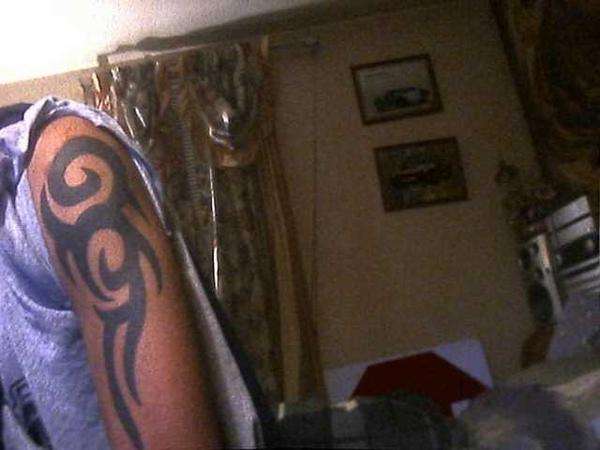 left arm tat tattoo