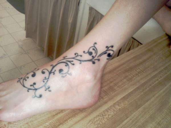 ankle tat tattoo