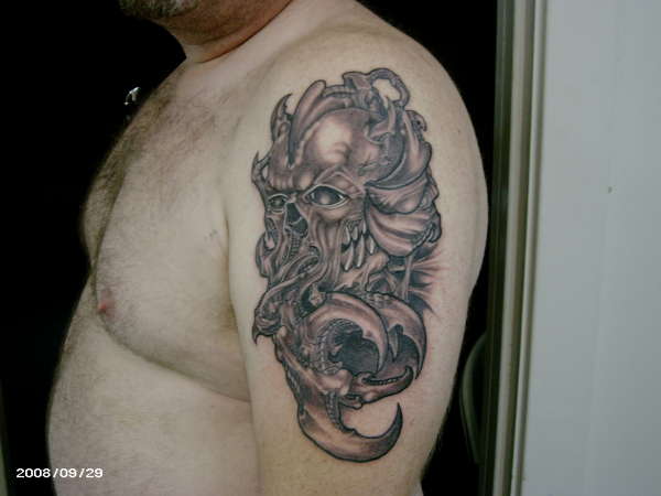 skull on arm tattoo
