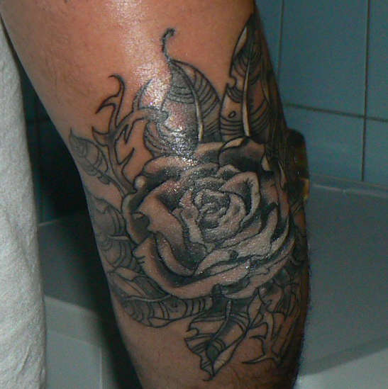 Elbow rose tattoo