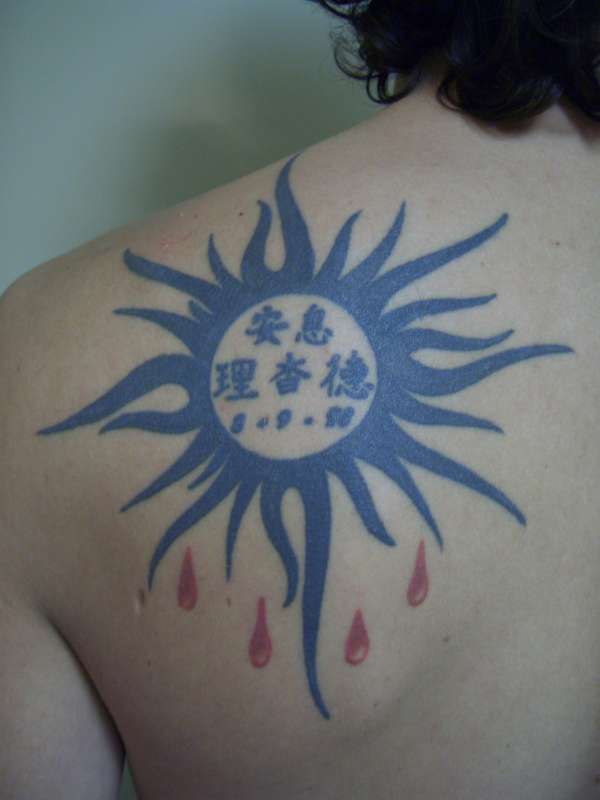 Tribal Sun. tattoo