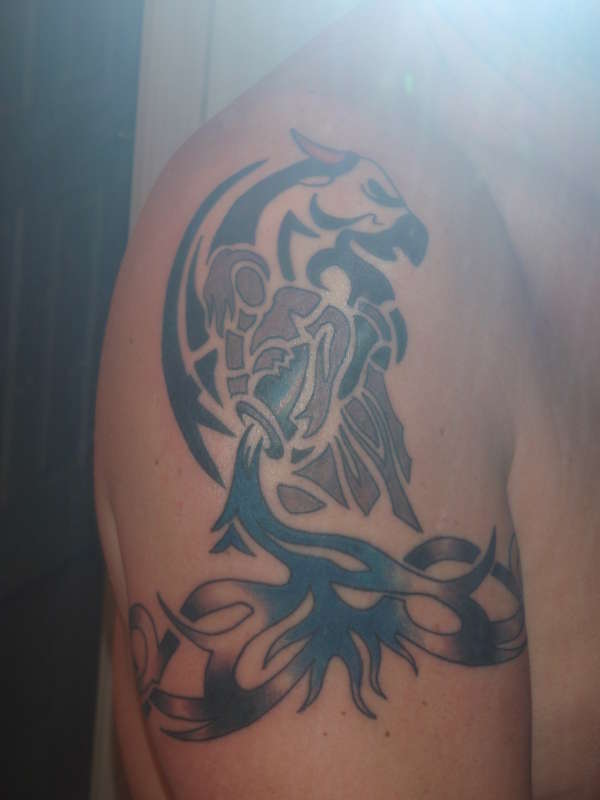 tribal zodiac tattoo