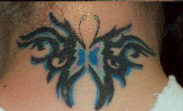 butterfly on neck tattoo