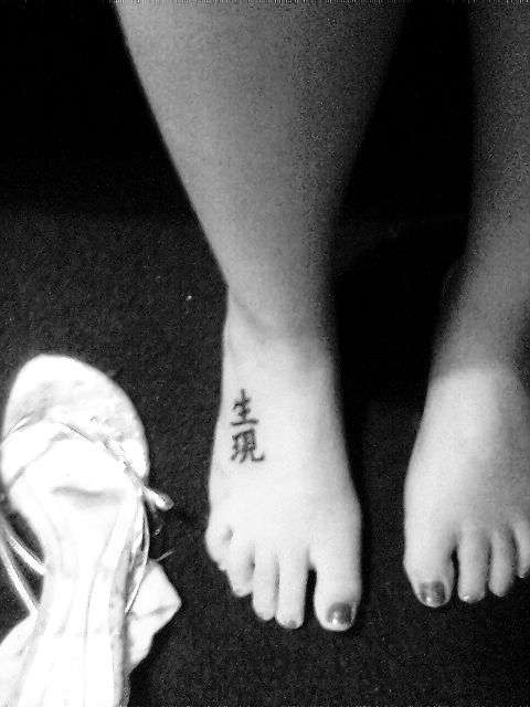 cute feet tattoo