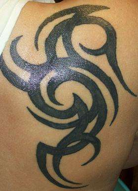tribal on shoulder tattoo