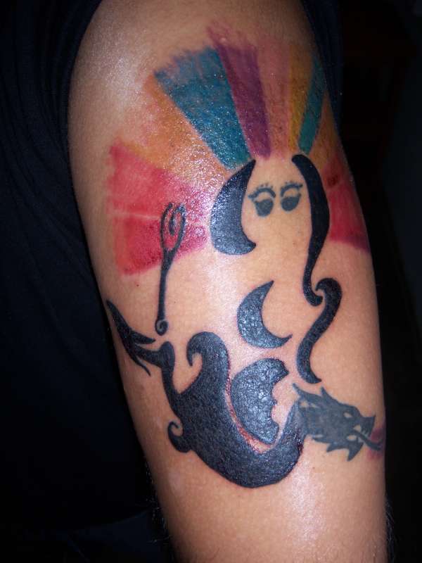 lord ganesha riding over a dragon tattoo