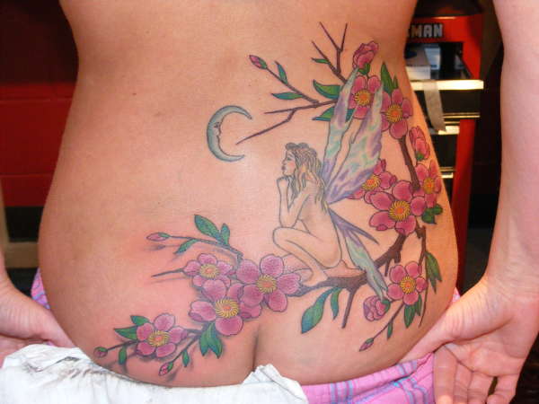 Fairy & Cherry Blossom branch tattoo